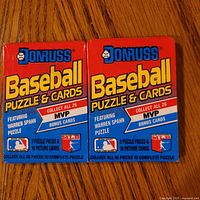 Front view of two sealed 1989 Donruss baseball card packs