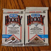 Front view showing two sealed 1991-92 Upper Deck NHL Hockey foil packs