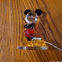 Full view of Mickey Mouse crystal figurine on base