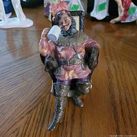 Front view of Royal Doulton "The Foaming Quart" figurine