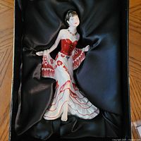 Figurine in satin-lined box