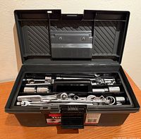 Open Craftsman toolbox showing upper tray loaded with chrome hand tools