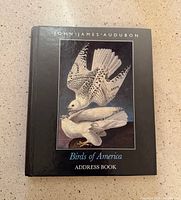 Front cover of address book showing Audubon artwork