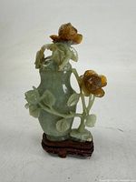 full view of jade vase with lid and stand