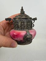 Overall view of lidded vessel showing jade body and metal mounts