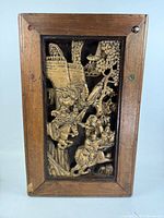 Full view of framed carved panel