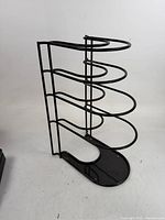 Full view of black five-slot vertical pan rack