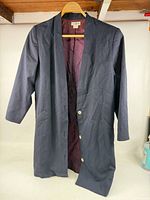 Front view of navy Condor long coat showing buttons and lining