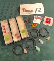Overview of all art glass jewellery and stone pendants