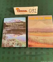 Front covers of both books with lot tag visible