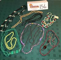 All twelve necklaces laid out for overview