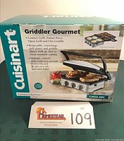 Front of sealed box showing product image and features