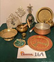 Group shot of all metalware pieces displayed together