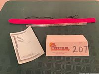 Flute, booklet, and lot identifier shown