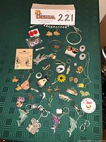 Full overhead view showing all jewellery and accessory items laid out on table