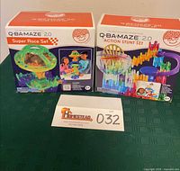 Both sealed Q-BA-MAZE 2.0 sets side by side