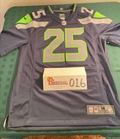 Front of Seattle Seahawks Nike jersey showing number 25, collar tags, size label