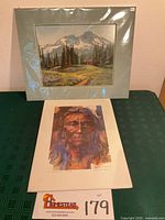 Both prints shown together: landscape above, portrait below