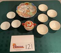 group shot of all ten porcelain pieces