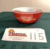 Full set of four nested rust wheat Pyrex bowls