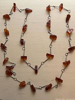 Full view of entire necklace showing overall length and bead distribution