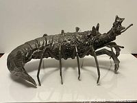 Right side view of pewter lobster sculpture