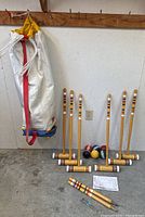 Full set showing mallets, balls, bag, stakes, pegs and instructions