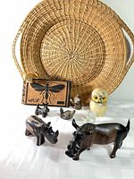 Group overview showing basket, plaque, all animal figurines