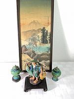 Watercolor in frame, ceramic fisherman, two cloisonné jars front view