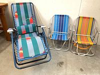 Group shot of chaise lounge and two folding chairs