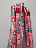 Cluster of Hello Kitty wrapping paper rolls showing pattern