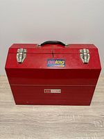 Front view closed toolbox showing Craftsman badge, handle, latches