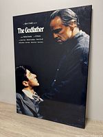 Full view of The Godfather glossy poster board