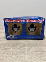 Front of boxed Hunter Collectibles Executive Glass Set showing two Toronto Maple Leafs glasses