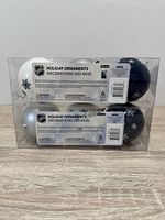 back view of two boxed ornament sets with NHL branding and barcode