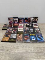 Overhead view of all 25 cassette tapes arranged in five rows