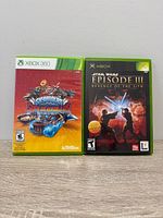 Front view of both game cases