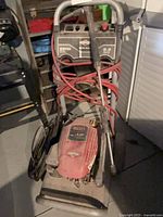 Full view of pressure washer with hose and wand