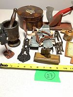 Group view of all items with measuring tape for scale