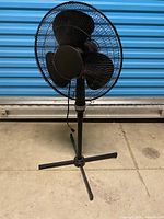 Front view of black 16-inch pedestal fan