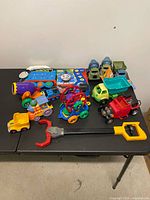 Overview of all preschool toys laid out on table