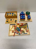 Overview of three wooden educational toys