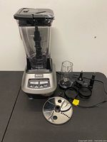 Full blender system with accessories displayed