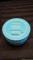 Top view showing Moroccanoil Smoothing Mask label, size 8.5 fl oz