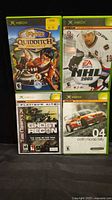 Group shot of four Xbox games showing front covers
