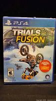 Front of sealed Trials Fusion PS4 game case