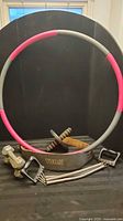 All items together: hula hoop, dumbbells, belts, ab roller, cable handles