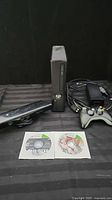 Console, Kinect, controller, power supply, cables, two game discs overview