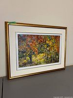 Framed acrylic landscape painting in gold frame