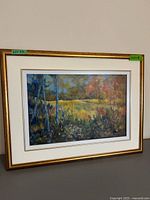 Full view of framed painting showing artwork, mat, and frame